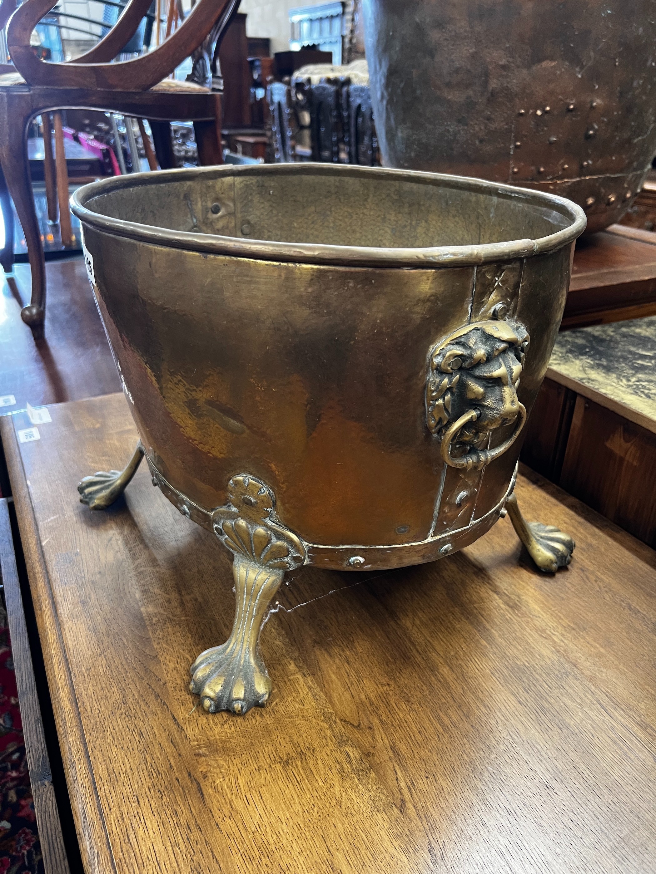 An oval brass Dutch style coal bin, width 41cm, depth 36cm, height 31cm